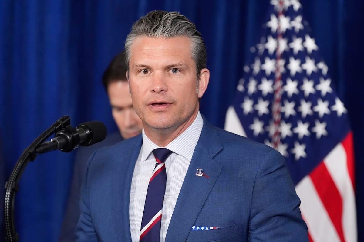 Defense Secretary Pete Hegseth speaking at a Pentagon ceremony