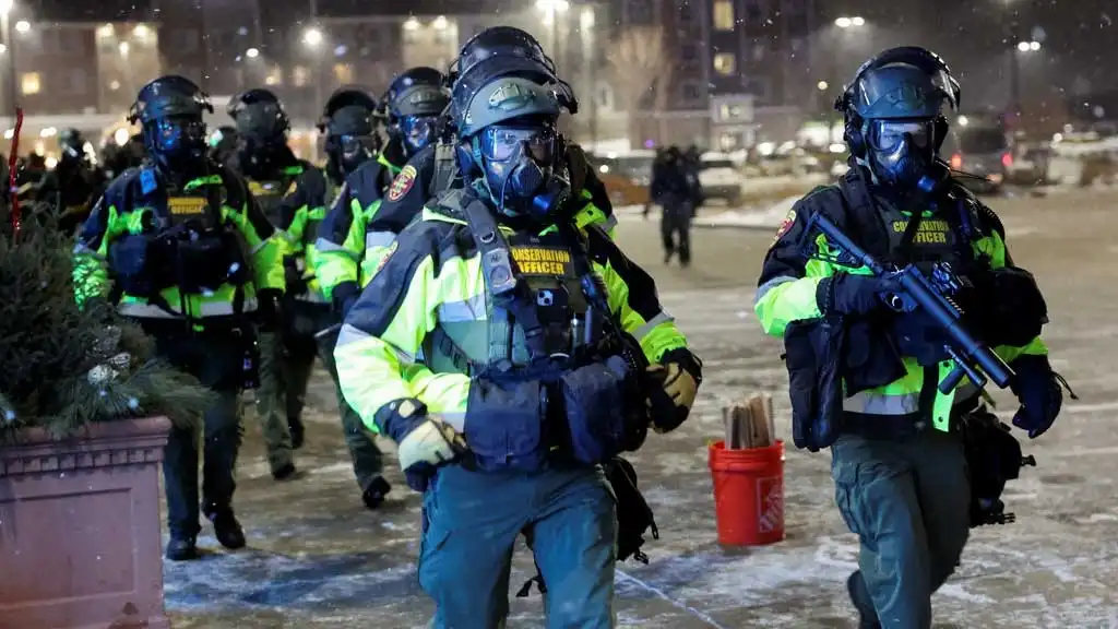 Federal agents near the scene of a shooting in Minneapolis